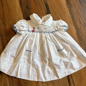 Smocked sailboat dress